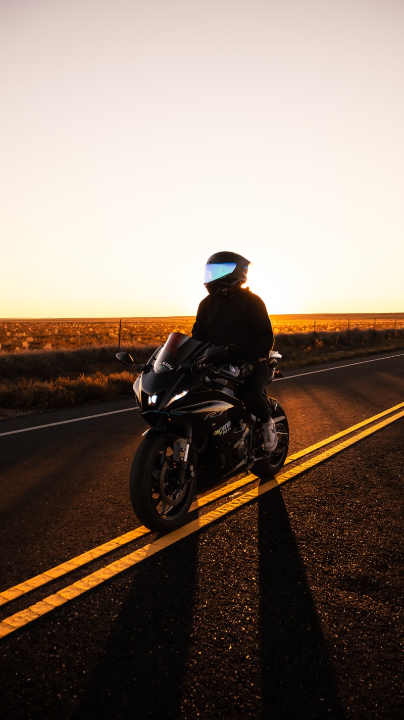 Motorcycle silhouette at sunset on a New Mexico highway